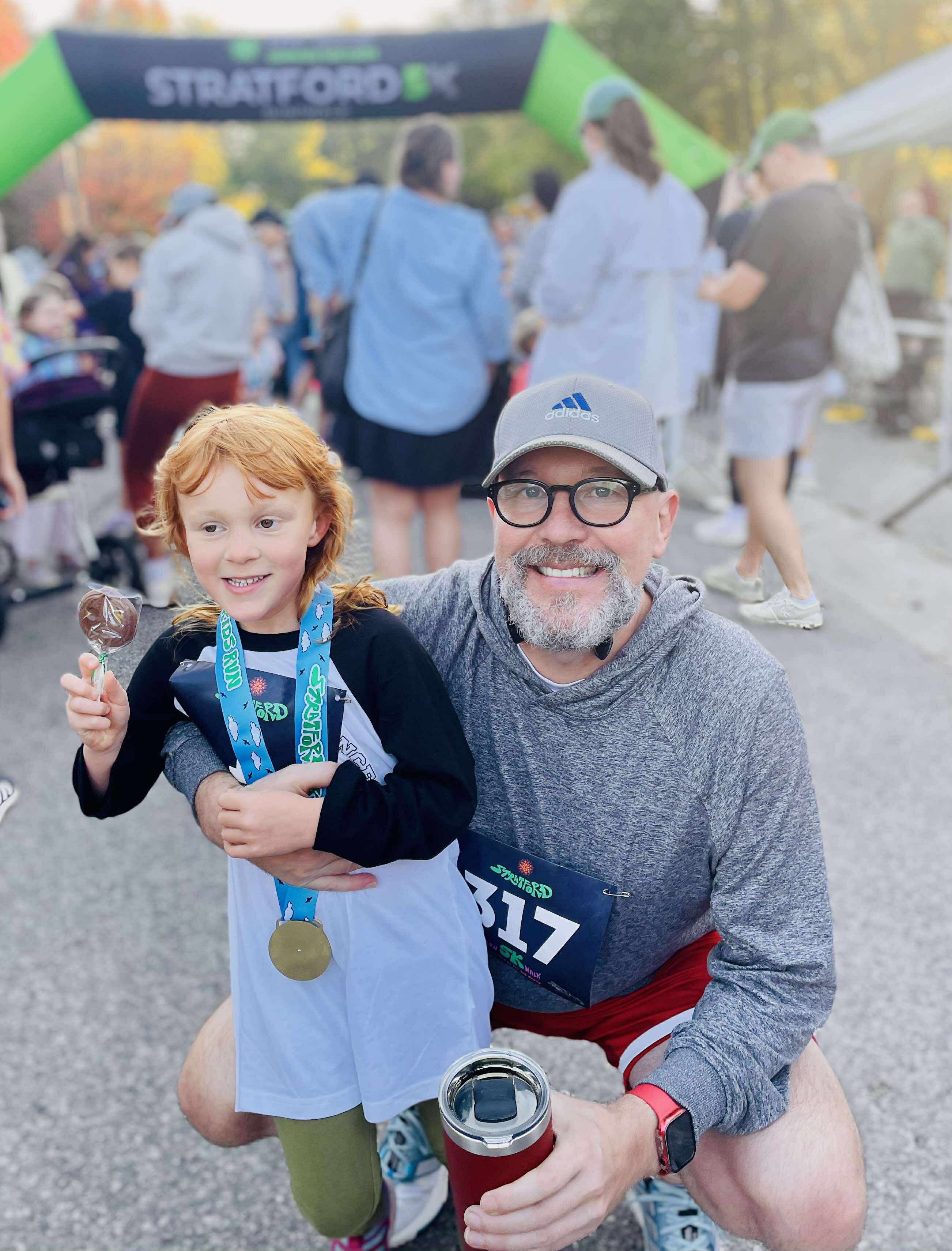 Post-race photo with daughter