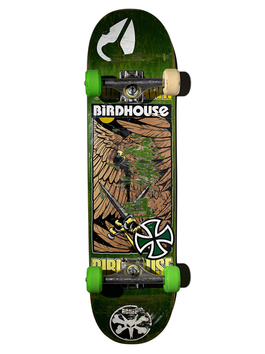 The Birdhouse Falcon skateboard Tony Hawk rode for his final 900, with green wheels and hawk graphic, now in the Smithsonian collection